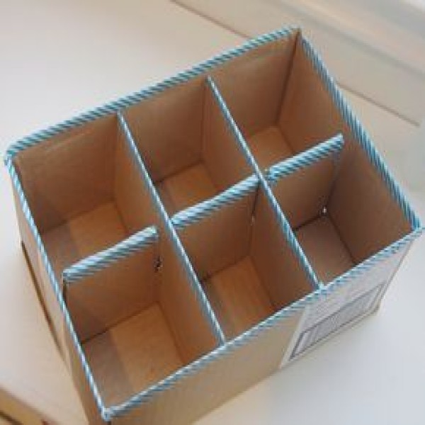 caixa organizadora de papelão com divisórias