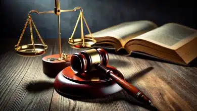 Comissões Permanentes da Câmara elegem 14 novos presidentes; veja os nomes 6 DALL·E 2025 03 19 17.15.34 A realistic photograph representing justice. The image features a judges gavel resting on a wooden table alongside a set of balanced golden scales.